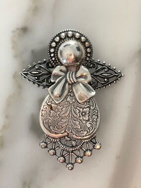 Ornate Silver-Tone Angel Brooch with Filigree Bow